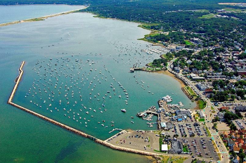 Aerial shot of Plymouth Harbor and coastline.