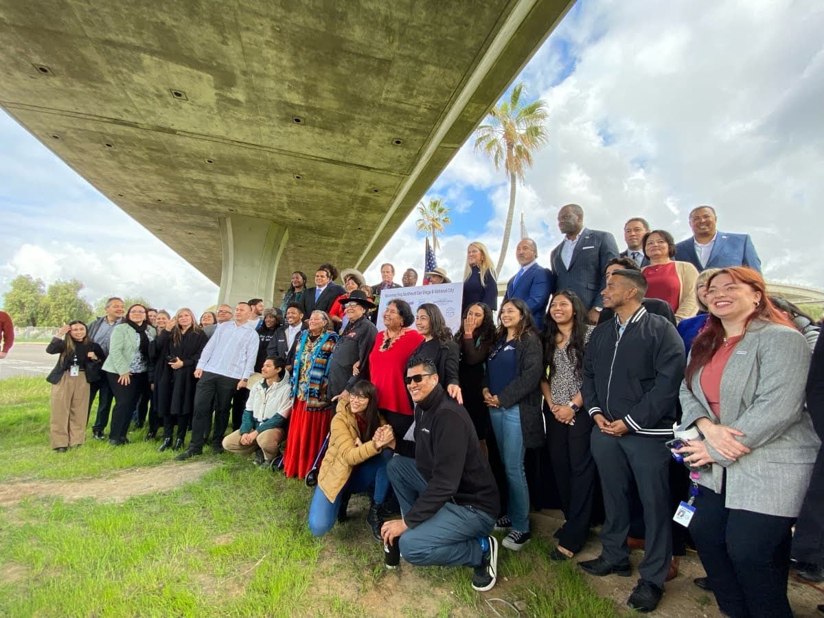 City-of-San-Diego_National-City-Reconnecting-Communities-press-conference Community members gather beneath the 43rd Street exit, a large check in hand, ready to tackle their project