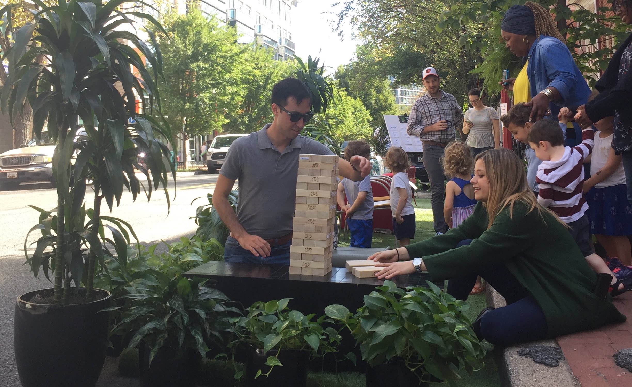  /></p>
<p>In 2005, three collaborators tested a new idea—they turned an underutilized and heavily subsidized piece of land (a parking spot) into a useful space with some grass, a bench, and a potted tree. People started using it almost immediately. Since posting the first picture of this DIY mini-park in San Francisco, this experiment in urban design has morphed into a global phenomenon. Now, hundreds of cities around the world hold PARK(ing) Day on the third Friday in September where dozens of parking spots that are usually reserved for stationary, empty cars are transformed into places for people.</p>
<p>According to John Bela, one of the brains behind the park that started it all, 