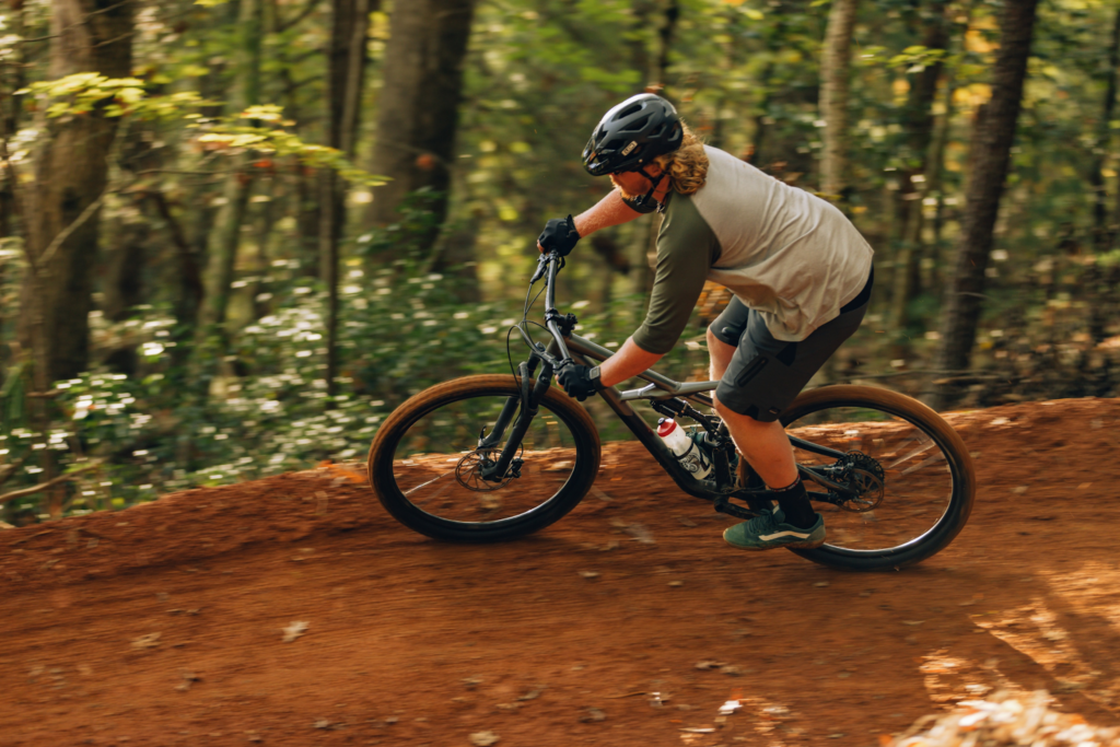 A mountain biker speeds down the new Unaka trail
