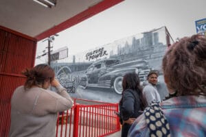 People looking at a sign