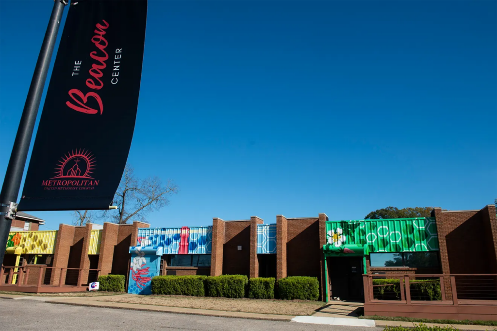 The Beacon Center, Montgomery AL with colorful murals on the side of the building